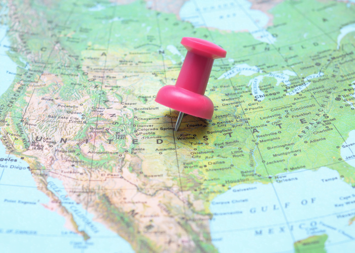 Map of United States with a push pin in it. Store locator for Pawsitive Cravings products | Premium dog chew treats and classic bully sticks.